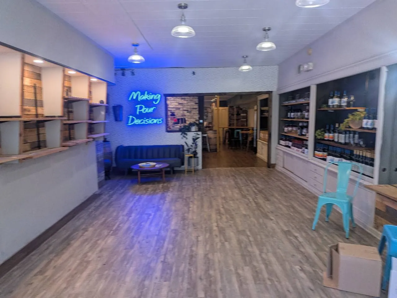 Inside Kog Hill Winery at 310 Vine Cellar, with the tasting bar and wine display
